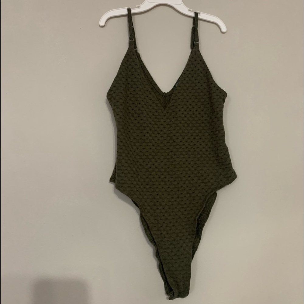 Olive Green Wild Fable Body suit. Never worn.